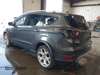 2019 Ford Escape Titanium with VIN 1FMCU9J97KUC55772, listed as a IAAI auction lot 42514001 with 77,737 mi miles and . Bid and sale history available at DreamBid. Image 3.