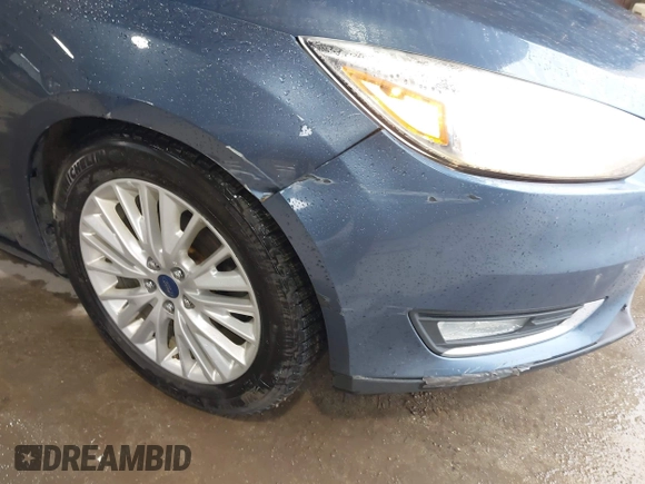 2018 Ford Focus Titanium with VIN 1FADP3N29JL242428, listed as a IAAI auction lot 42323967 with 200,662 mi miles and . Bid and sale history available at DreamBid. Image 6.