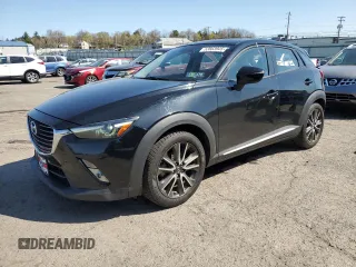 2016 Mazda CX-3 Grand Touring z VIN JM1DKBD79G0124504, wystawiony jako Copart lot #53663945 z przebiegiem 94 253 mil mil oraz Szkoda całkowita • Salvage title. Historia ofert i sprzedaży dostępna na DreamBid. Obrazek 1.