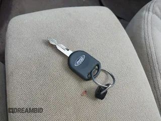 2004 Ford Taurus z VIN 1FAHP55U74G112479, wystawiony jako IAAI lot #42207775 z przebiegiem 97 491 mil mil oraz . Historia ofert i sprzedaży dostępna na DreamBid. Obrazek 11.
