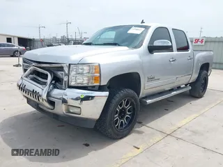 2013 Chevrolet Silverado 1500 LT with VIN 3GCPCSE08DG297496, listed as a IAAI auction lot 42046611 with 246,657 mi miles and . Bid and sale history available at DreamBid. Image 2.