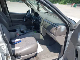 2003 Jeep Grand Cherokee Laredo with VIN 1J4GW48S73C605561, listed as a IAAI auction lot 42424407 with Not provided miles and . Bid and sale history available at DreamBid. Image 5.