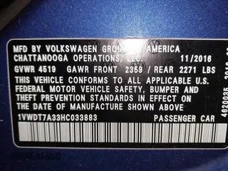 2017 Volkswagen Passat R-Line w/Comfort Pkg with VIN 1VWDT7A33HC033883, listed as a IAAI auction lot 42042563 with 410,105 mi miles. Bid and sale history available at carsss.com. Image 9.