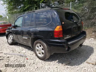 2004 GMC Envoy SLT with VIN 1GKDT13S042281050, listed as a Copart auction lot 60024304 with 267,205 mi miles and Salvage Title. Bid and sale history available at carsss.com. Image 2.
