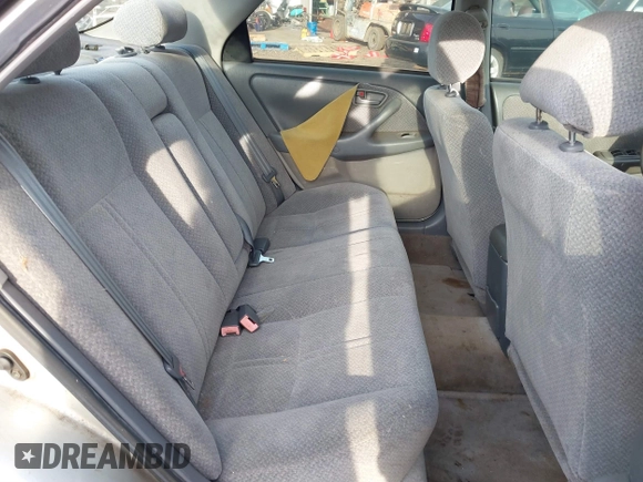 2000 Toyota Camry LE z VIN JT2BF28K6Y0282836, wystawiony jako IAAI lot #41799376 z przebiegiem 210 710 mil mil oraz . Historia ofert i sprzedaży dostępna na DreamBid. Obrazek 8.