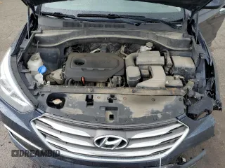 2018 Hyundai Santa Fe 2.4L z VIN 5NMZTDLB7JH077713, wystawiony jako Copart lot #56671245 z przebiegiem 90 442 mil mil oraz Szkoda całkowita • Salvage title. Historia ofert i sprzedaży dostępna na DreamBid. Obrazek 12.