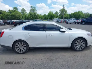 2013 Lincoln MKS EcoBoost with VIN 1LNHL9FT0DG606567, listed as a IAAI auction lot 42561162 with 285,830 mi miles and . Bid and sale history available at DreamBid. Image 13.
