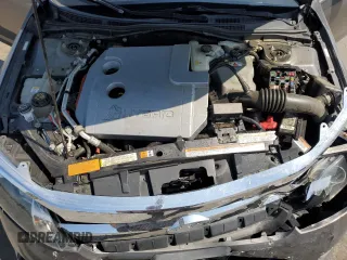 2010 Ford Fusion Hybrid z VIN 3FADP0L33AR267806, wystawiony jako Copart lot #55952815 z przebiegiem 146 912 mil mil oraz Szkoda całkowita • Salvage title. Historia ofert i sprzedaży dostępna na DreamBid. Obrazek 11.