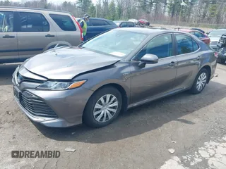 2019 Toyota Camry Hybrid LE z VIN 4T1B31HK0KU509265, wystawiony jako IAAI lot #42014204 z przebiegiem 136 560 mil mil oraz . Historia ofert i sprzedaży dostępna na DreamBid. Obrazek 2.