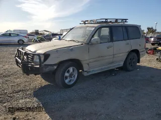 2001 Toyota Land Cruiser with VIN JTEHT05J012006393, listed as a Copart auction lot 50062695 with 319,586 mi miles and Clean Title. Bid and sale history available at carsss.com. Image 1.