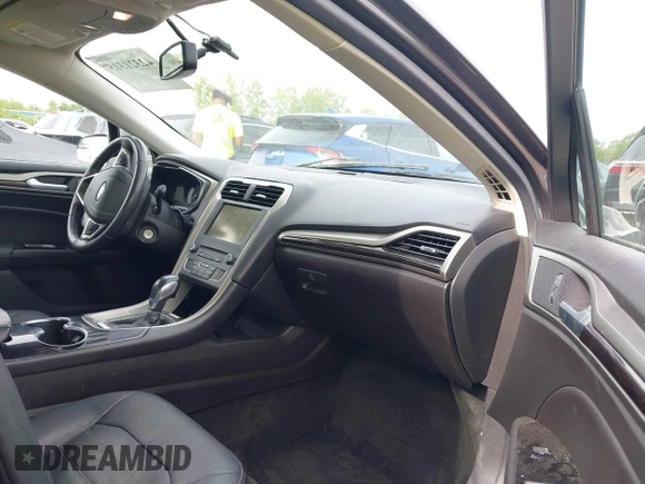 2016 Ford Fusion SE z VIN 3FA6P0HD9GR164473, wystawiony jako IAAI lot #42321315 z przebiegiem 120 005 mil mil oraz . Historia ofert i sprzedaży dostępna na DreamBid. Obrazek 5.