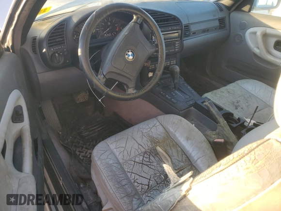 1998 BMW 3 Series z VIN WBABK8330WEY89818, wystawiony jako Copart lot #41557015 z przebiegiem 253 522 mil mil oraz Nie do naprawy • Non repairable. Historia ofert i sprzedaży dostępna na DreamBid. Obrazek 8.