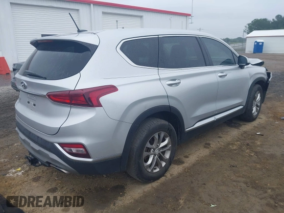 2019 Hyundai Santa Fe SE z VIN 5NMS23AD4KH130517, wystawiony jako IAAI lot #42324854 z przebiegiem 76 963 mil mil oraz . Historia ofert i sprzedaży dostępna na DreamBid. Obrazek 4.