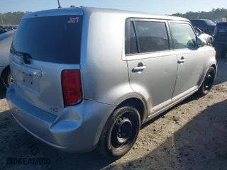 2009 Scion xB with VIN JTLKE50E991076881, listed as a IAAI auction lot 41842788 with 123,728 mi miles. Bid and sale history available at carsss.com. Image 4.