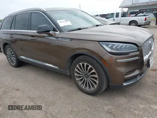2022 Lincoln Aviator Reserve z VIN 5LM5J7WC7NGL17505, wystawiony jako IAAI lot #42127205 z przebiegiem 35 018 mil mil oraz . Historia ofert i sprzedaży dostępna na DreamBid. Obrazek 1.