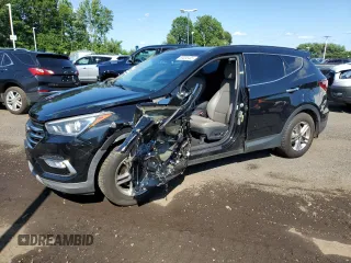 2018 Hyundai Santa Fe 2.4L with VIN 5XYZUDLB4JG571356, listed as a Copart auction lot 63036405 with 154,363 mi miles and Salvage title. Bid and sale history available at DreamBid. Image 1.