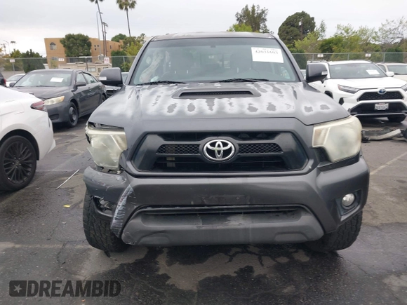 2014 Toyota Tacoma PreRunner with VIN 3TMJU4GN5EM167783, listed as a IAAI auction lot 42031603 with 179,574 mi miles and . Bid and sale history available at DreamBid. Image 12.