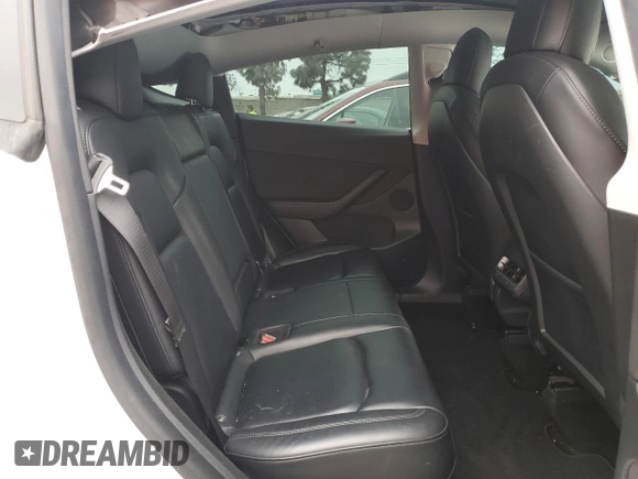 2021 Tesla Model Y Long Range with VIN 5YJYGDEE3MF214823, listed as a Copart auction lot 50738045 with 63,227 mi miles and Salvage Title. Bid and sale history available at DreamBid. Image 11.