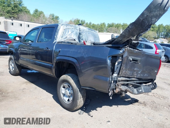 2023 Toyota Tacoma SR with VIN 3TMCZ5AN0PM614127, listed as a IAAI auction lot 41974924 with 12,674 mi miles and . Bid and sale history available at DreamBid. Image 3.