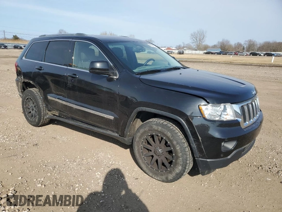 2012 Jeep Grand Cherokee Laredo with VIN 1C4RJFAG5CC280262, listed as a Copart auction lot 48686475 with 130,673 mi miles and Salvage Title. Bid and sale history available at carsss.com. Image 4.