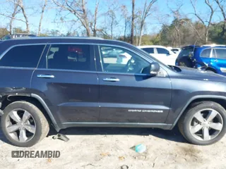 2014 Jeep Grand Cherokee Limited with VIN 1C4RJEBT5EC189033, listed as a IAAI auction lot 41156781 with 126,367 mi miles and . Bid and sale history available at DreamBid. Image 13.