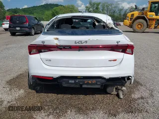 2023 Kia K5 LXS z VIN 5XXG14J25PG189448, wystawiony jako IAAI lot #42258739 z przebiegiem 29 188 mil mil oraz . Historia ofert i sprzedaży dostępna na DreamBid. Obrazek 17.