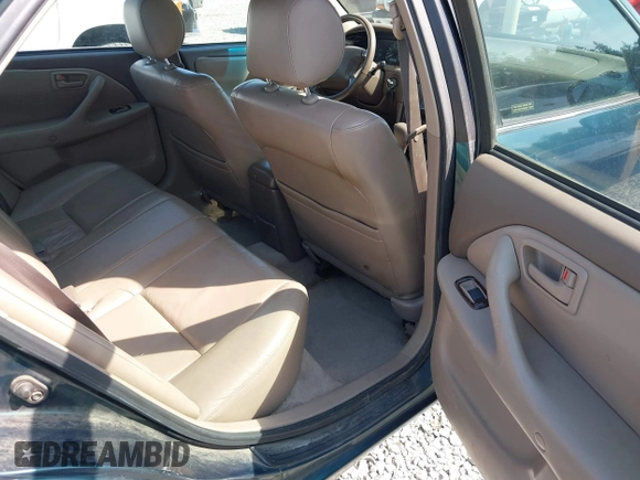 1998 Toyota Camry LE z VIN JT2BF28K4W0101312, wystawiony jako IAAI lot #42116546 z przebiegiem 365 712 mil mil oraz . Historia ofert i sprzedaży dostępna na DreamBid. Obrazek 8.