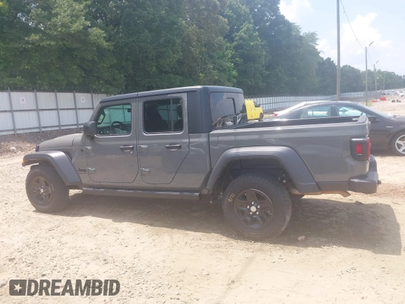 2023 Jeep Gladiator Sport S с VIN 1C6HJTAG7PL522721, выставлен на аукционе IAAI как лот 42594463 с пробегом 64 702 миль миль и . История ставок и продаж доступна на DreamBid. Изображение 14.