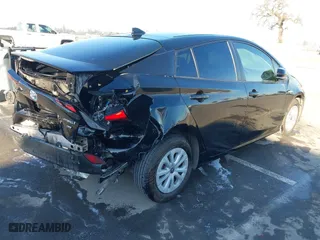 2019 Toyota Prius L Eco with VIN JTDKARFU9K3090948, listed as a IAAI auction lot 41400008 with 113,323 mi miles. Bid and sale history available at carsss.com. Image 4.