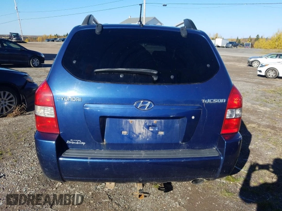 2006 Hyundai Tucson GL with VIN KM8JM72B76U405771, listed as a Copart auction lot 76751074 with 233,649 mi miles and Salvage Title. Bid and sale history available at carsss.com. Image 6.