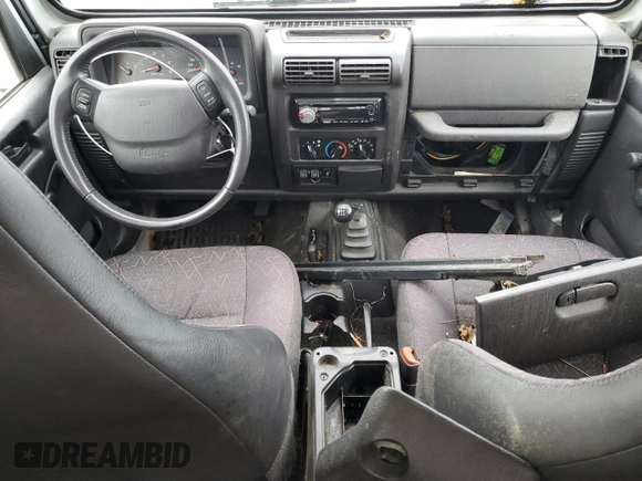 2002 Jeep Wrangler Sport with VIN 1J4FA49S32P733909, listed as a Copart auction lot 72776204 with 157,508 mi miles and Non Repairable. Bid and sale history available at carsss.com. Image 8.