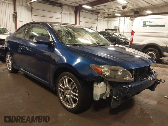 2009 Scion tC with VIN JTKDE167990297921, listed as a IAAI auction lot 41720687 with 159,960 mi miles. Bid and sale history available at carsss.com. Image 1.