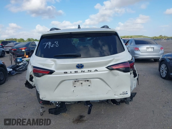 2021 Toyota Sienna XLE with VIN 5TDYRKEC7MS017968, listed as a IAAI auction lot 42145440 with 85,989 mi miles and . Bid and sale history available at DreamBid. Image 17.