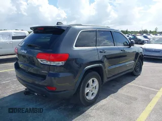 2014 Jeep Grand Cherokee Laredo with VIN 1C4RJEAG0EC179563, listed as a IAAI auction lot 39799427 with 209,169 mi miles and . Bid and sale history available at DreamBid. Image 4.