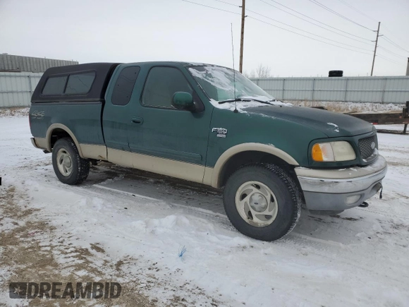 2000 Ford F-150 XL with VIN 2FTRX18L5YCB19092, listed as a Copart auction lot 43812505 with 139,503 mi miles and Salvage Title. Bid and sale history available at carsss.com. Image 4.
