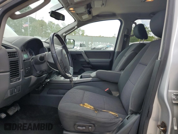2010 Nissan Titan SE with VIN 1N6BA0ED2AN313022, listed as a Copart auction lot 51222275 with 137,640 mi miles and Salvage title. Bid and sale history available at DreamBid. Image 7.