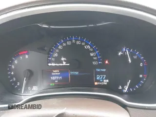 2015 Cadillac SRX Premium Collection with VIN 3GYFNGE37FS538763, listed as a IAAI auction lot 41864133 with 107,711 mi miles. Bid and sale history available at carsss.com. Image 7.