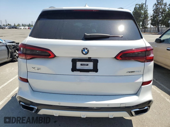 2019 BMW X5 xDrive40i with VIN 5UXCR6C57KLK85504, listed as a Copart auction lot 60908665 with 21,333 mi miles and Salvage title. Bid and sale history available at DreamBid. Image 6.
