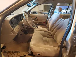 2000 Ford Crown Victoria LX z VIN 2FAFP74WXYX116130, wystawiony jako Copart lot #79441204 z przebiegiem 128 133 mil mil oraz Szkoda całkowita • Salvage title. Historia ofert i sprzedaży dostępna na DreamBid. Obrazek 7.
