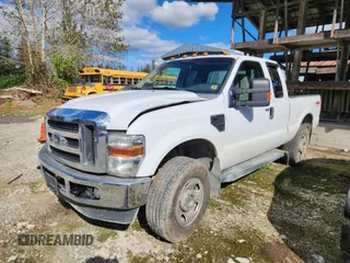 2009 Ford F-350 XL with VIN 1FTWX31579EA59709, listed as a Copart auction lot 69289714 with 231,511 mi miles and Salvage Title. Bid and sale history available at DreamBid. Image 1.