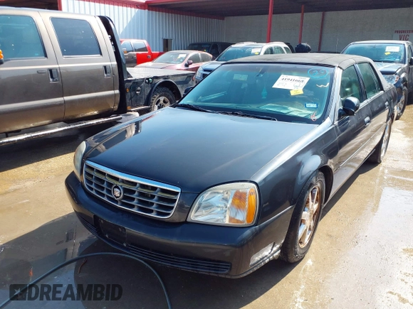 2001 Cadillac DeVille DHS z VIN 1G6KE57YX1U190955, wystawiony jako IAAI lot #41941668 z przebiegiem 191 040 mil mil oraz . Historia ofert i sprzedaży dostępna na DreamBid. Obrazek 6.