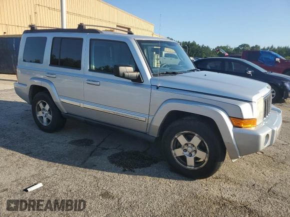 2010 Jeep Commander Sport with VIN 1J4RG4GK4AC125711, listed as a Copart auction lot 60369545 with 209,522 mi miles and Clean title. Bid and sale history available at DreamBid. Image 4.