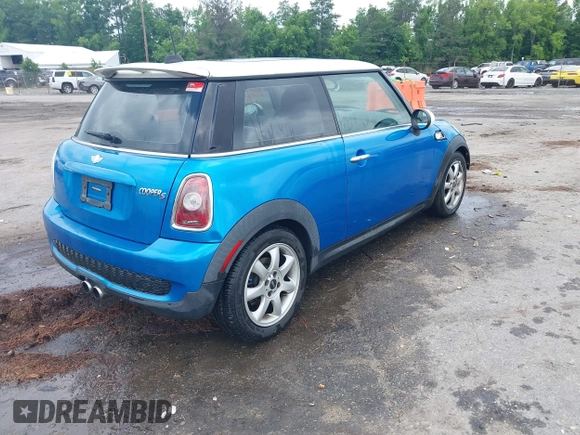 2010 MINI Hardtop S with VIN WMWMF7C55ATW88946, listed as a IAAI auction lot 42443200 with 104,953 mi miles and . Bid and sale history available at DreamBid. Image 4.
