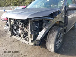 2017 Honda Pilot EX-L with VIN 5FNYF6H5XHB059834, listed as a IAAI auction lot 41670003 with 58,285 mi miles and . Bid and sale history available at DreamBid. Image 6.