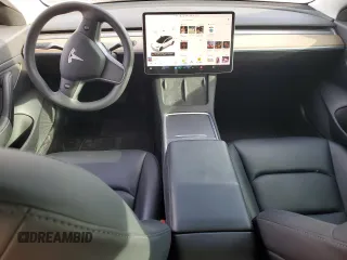 2021 Tesla Model 3 Standard Range Plus with VIN 5YJ3E1EA2MF923156, listed as a Copart auction lot 50098135 with 50,917 mi miles and Salvage Title. Bid and sale history available at carsss.com. Image 8.