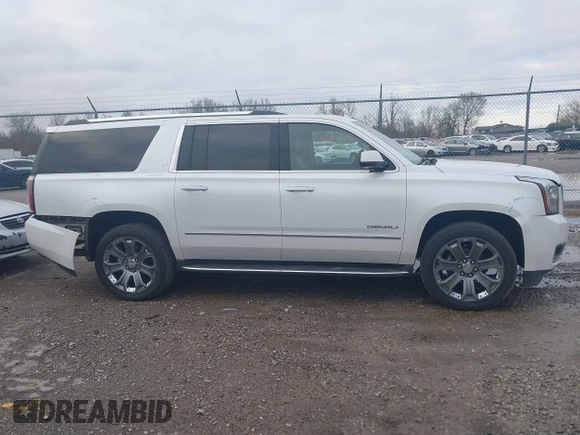 2016 GMC Yukon XL Denali with VIN 1GKS2HKJ9GR264481, listed as a IAAI auction lot 41764272 with 114,852 mi miles. Bid and sale history available at carsss.com. Image 13.