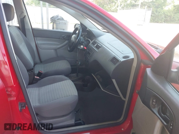 2007 Ford Focus S z VIN 1FAFP34N07W363568, wystawiony jako IAAI lot #42557496 z przebiegiem 120 123 mil mil oraz . Historia ofert i sprzedaży dostępna na DreamBid. Obrazek 5.