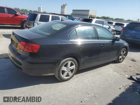 2014 Volkswagen Jetta TDI w/Premium with VIN 3VW3L7AJ2EM392016, listed as a Copart auction lot 69305904 with 111,903 mi miles and Salvage title. Bid and sale history available at DreamBid. Image 3.