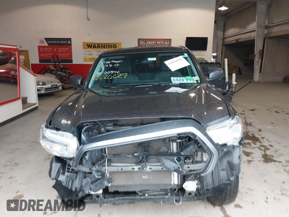 2020 Toyota Tacoma SR with VIN 3TYRX5GN5LT005461, listed as a IAAI auction lot 42020692 with 71,548 mi miles and . Bid and sale history available at DreamBid. Image 12.