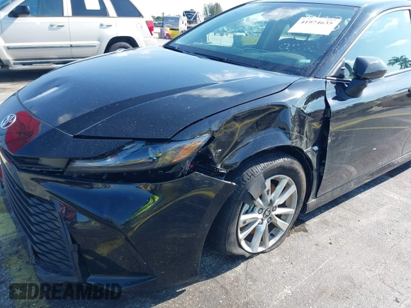 2025 Toyota Camry LE with VIN 4T1DAACK7SU518065, listed as a IAAI auction lot 41974635 with 17,279 mi miles and . Bid and sale history available at DreamBid. Image 6.